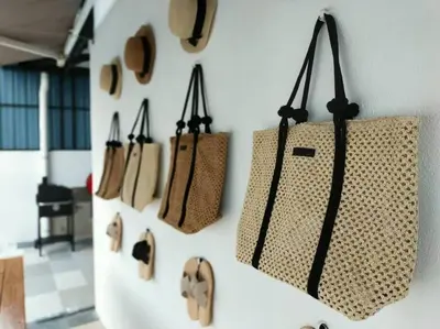 a group of bags hanging on a wall at Bole Villa-Private Pool-BBQ-Karaoke 20pax in Ipoh