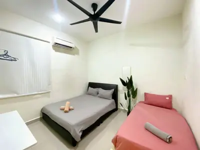 a bedroom with a bed and a ceiling fan at Modern COZY SINGLE STOREY HOUSE ```` ALMA JUSCO BM in Bukit Mertajam