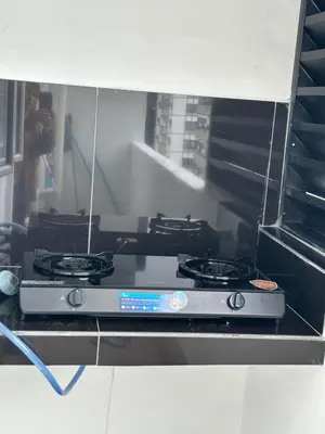 a stove with four burners sitting on a shelf at Adik Aisyah Black forest Cameron Highlands homestay For Muslim in Cameron Highlands