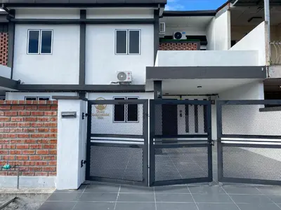 a gate in front of a house at Dudu Guesthouse Ipoh in Ipoh