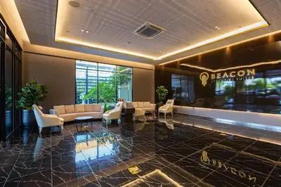 a lobby of a hotel with couches and chairs at Rooftop Pool, 8 Pax, 2 Bedrooms, 2 Bathrooms, 2 Car Parks by Star Home in Jelutong