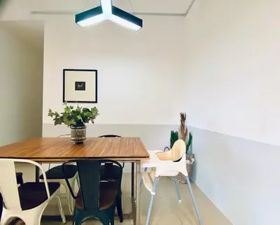 a dining room with a table and chairs at The Cove Hillside@Loft in Ipoh