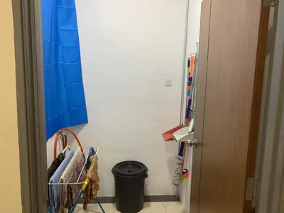 a small bathroom with a trash can in a room at Ipoh Waterpark Pool View Homestay in Ipoh