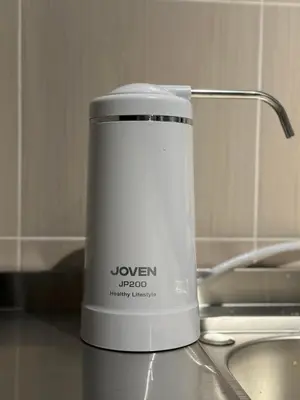 a white toaster sitting on top of a counter at Be Right Back Loft - Bukit Mertajam in Bukit Mertajam