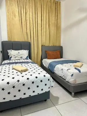two beds sitting next to each other in a bedroom at Spacious 3BR I Meritus Perai l Family & Nice View in Perai