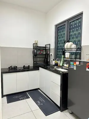 a kitchen with a black and white counter top at Spacious 3BR I Meritus Perai l Family & Nice View in Perai