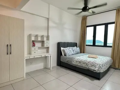 a bedroom with a bed and a window at Spacious 3BR I Meritus Perai l Family & Nice View in Perai
