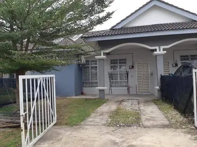 a house with a white gate in front of it at Ammar Homestay Gua Musang in Gua Musang