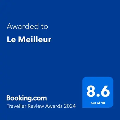 a screenshot of a cell phone with the text awarded to le melivourt at Le Meilleur in George Town