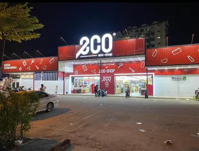 a store with a sign on the front of it at Spice Arena Guesthouse in Bayan Lepas