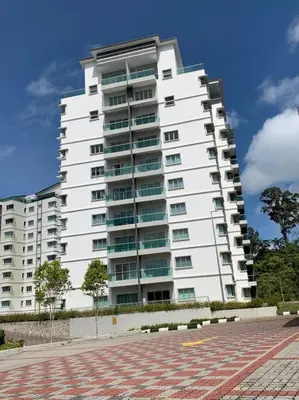 a large white apartment building with a lot of windows at Green Terrace at Quintet (3BR/ 8 Pax） in Tanah Rata