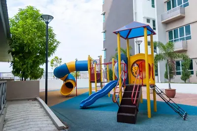 a playground in a building with a slide at Ipoh Town P Kepayang in Ipoh