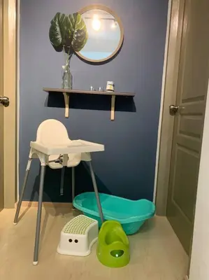 a bathroom with a sink and a mirror at Highland Green at Quintet (3BR/ 8pax) in Tanah Rata
