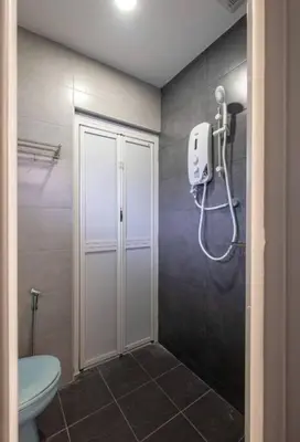 a bathroom with a shower stall and a toilet at JOVIAL COZY&STYLISH 2STORYHOUSE 4ROOM@BMJURU in Bukit Mertajam