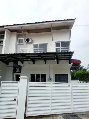 a white house with a white fence in front of it at JOVIAL COZY&STYLISH 2STORYHOUSE 4ROOM@BMJURU in Bukit Mertajam