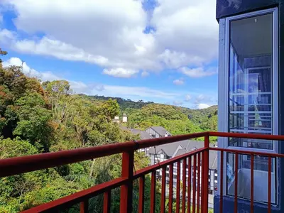a balcony with a view of the mountains at Dream4 @ emerald avenue in Brinchang