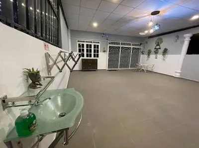 a bathroom with a sink in a room at Cozy Stay At Raintown Taiping in Kamunting