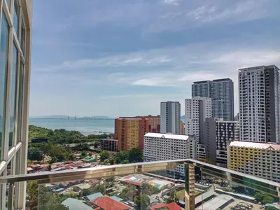 a view of the city from the balcony of a building at Deluxe Suites 2, Netflix ,2-5 pax, Georgetown in George Town