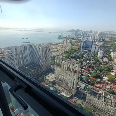 a view of a city from a skyscraper at Urban Suites JSW GEORGETOWN PENANG, MALAYSIA in Jelutong