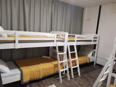 a room with two bunk beds in a room at G FORTUNE GUEST HOUSE+ in George Town