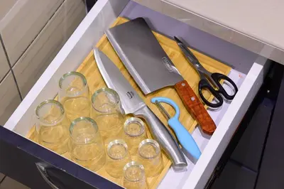 a drawer with glasses and scissors and a knife at Serene Mossy Family Cottage(2-7pax) 10 Min to BOH in Cameron Highlands