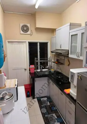 a kitchen with a sink and a stove top oven at Anoi Homestay TAMBUN @ Lost World HighSpeed WiFi in Tambun