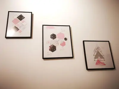 three framed pictures on a wall with a christmas tree at Minimaliste Ipoh Garden 2 minute to stadium 5BR5BR in Ipoh