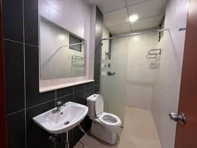 a bathroom with a toilet and a sink and a shower at Delisha Homestay 3R2B The Retreat,Aranda Nova in Brinchang