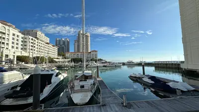 a group of boats are docked in a marina at Straits Quay Highest & Spacious Seaview Suite - 2 in Tanjong Tokong