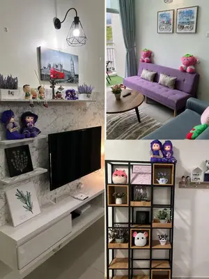a living room with a purple couch and a tv at Sweet Homestay 3RM @ Penthouse Apartment in Brinchang in Brinchang