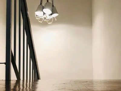 a chandelier and a staircase in a room at INS White House Ipoh in Ipoh