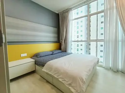 a bedroom with a bed and a large window at Deluxe Suites 5, 2-4 pax , Netflix, Georgetown in Jelutong