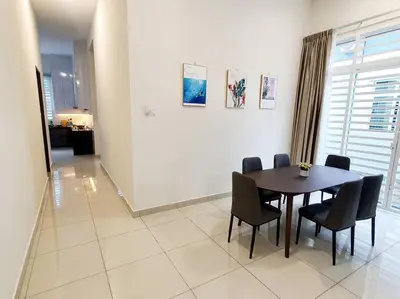 a dining room with a table and chairs at JOVIAL SingleStorey Bungalow 4Room10Pax `Alma in Bukit Mertajam