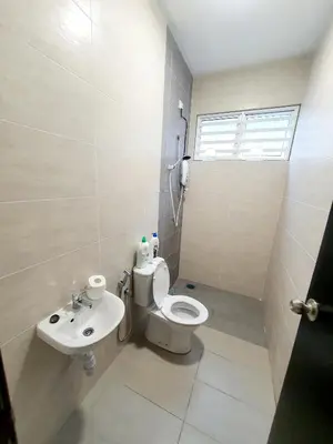 a bathroom with a toilet and a sink at JOVIAL SingleStorey Bungalow 4Room10Pax `Alma in Bukit Mertajam