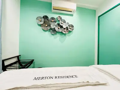 a room with a heart shaped wall with a bed at The Majestic Ipoh Town - Mountain View in Ipoh