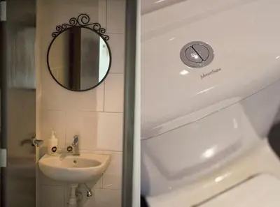 a bathroom with a sink and a mirror at The Majestic Ipoh Town - Mountain View in Ipoh