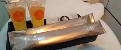 two drinks sitting on a table with a tray at Sense Hotel Taiping in Taiping
