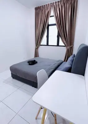 a bedroom with a bed and a window and a table at TheSun #3BR #PISA #FTZ #FamilyStay #USM in Bayan Lepas