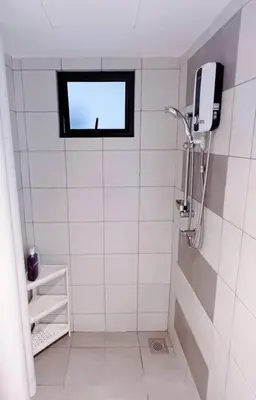 a bathroom with a shower with a window in it at TheSun #3BR #PISA #FTZ #FamilyStay #USM in Bayan Lepas