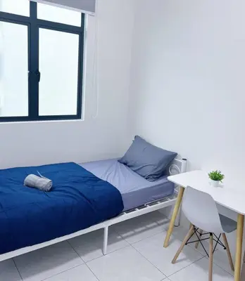 a bed in a room with a table and a window at TheSun #3BR #PISA #FTZ #FamilyStay #USM in Bayan Lepas