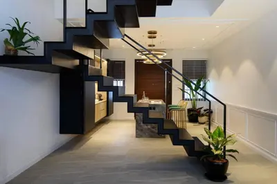 a hallway with a staircase in a house at Georgetown Luxury Heritage House 4BR 10Pax in George Town