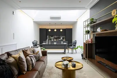 a living room with a couch and a table at Georgetown Luxury Heritage House 4BR 10Pax in George Town