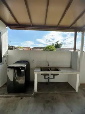a white table and a sink on a patio at Ipoh stadium 1min/wahkeongpark simee 18pax bungalow cottage in Ipoh
