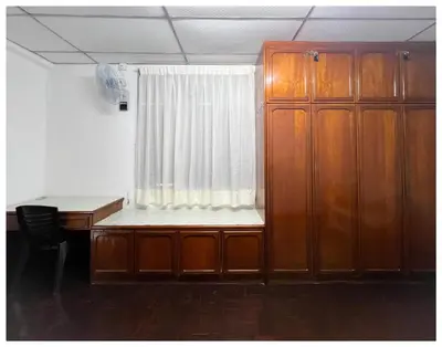 a room with a desk and a window at ✩ 23 HOUSE ✩ 23号 复古老宅 ✩ Vintage Homestay in Butterworth