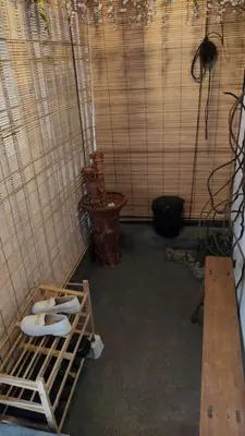 a bathroom with two toilets in a tiled wall at Comfy Home Near to Penang Hill in Ayer Itam