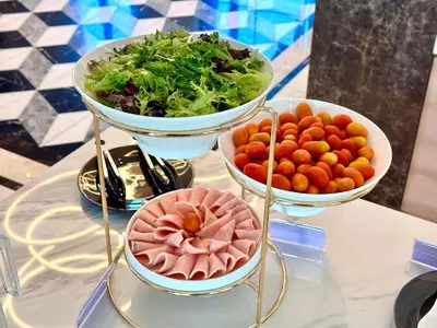 a table with three plates of food on a table at Cameron Lavender Mansion by PLAY in Brinchang