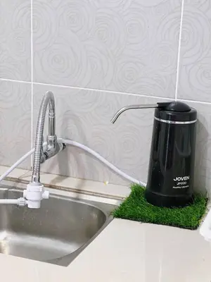 a coffee pot sitting on a counter next to a sink at Manhanttan Ipoh Waterpark Homestay By Warmth Stay 4-7pax 3BR in Ipoh