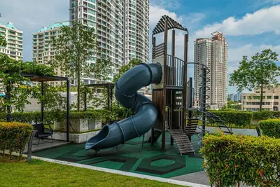a playground with a slide in a city at Family Seaview Suite with 3 Rooms by The Only Bnb in Tanjong Tokong