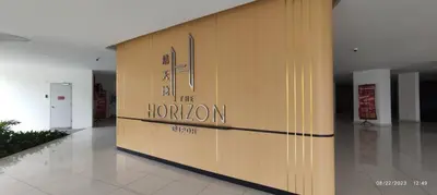 a wooden wall in a building with the hormon sign on it at The Horizon Ipoh Stay by Grab A Stay in Ipoh