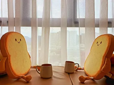 two cookies and cups sitting on a window sill at Mocha Suite @ The Horizon Ipoh [4 to 6 pax] in Ipoh